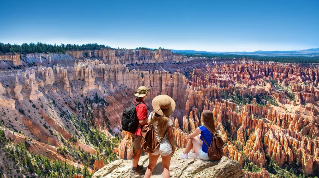 A family enjoys hiking at the Grand Canyon